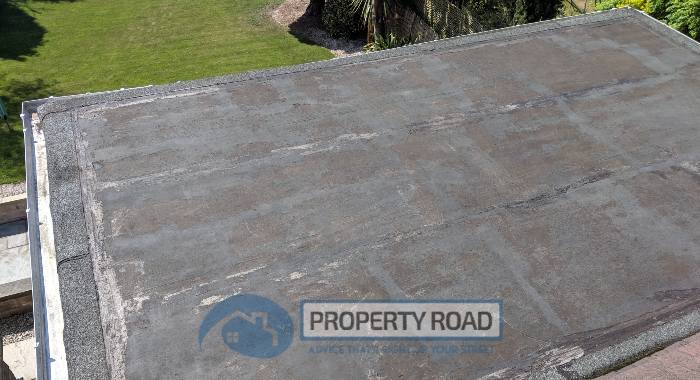 Our flat roof before we re-sealed it