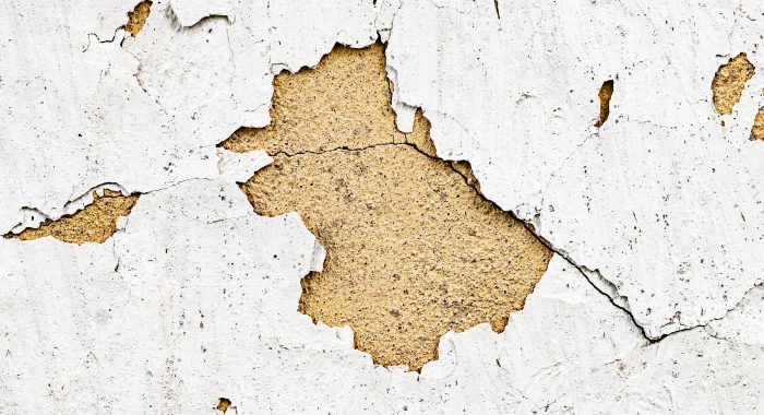 Buying a house with rendered walls means you'll have to be extra vigilant for surface flaws, hollow spots, cracks, and window clearance when checking the condition of the render.